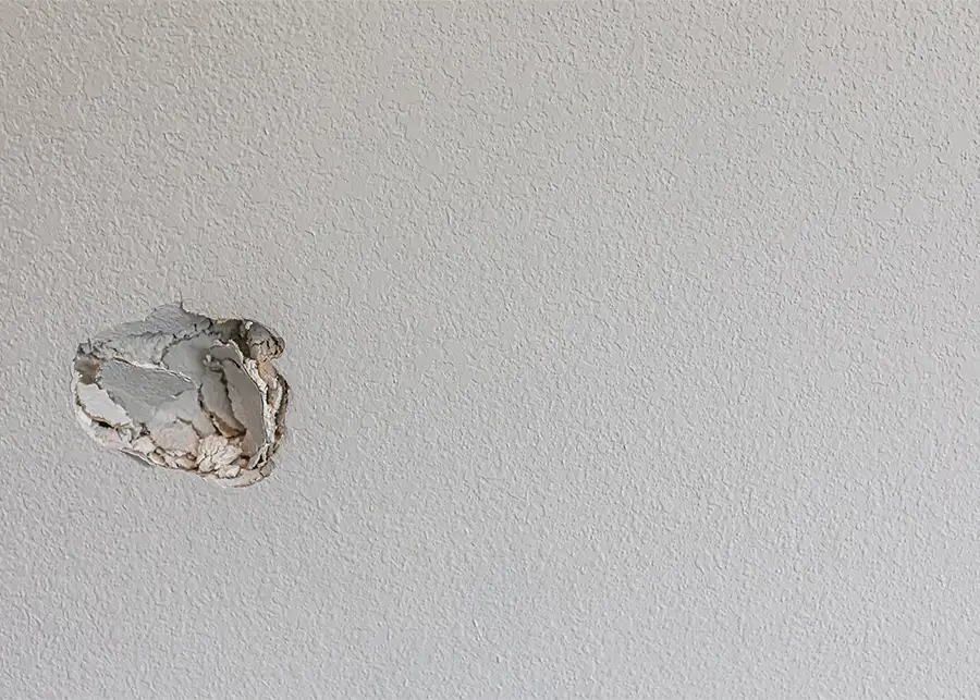 damaged drywall, hole in drywall needs repair - Bloomington, IL